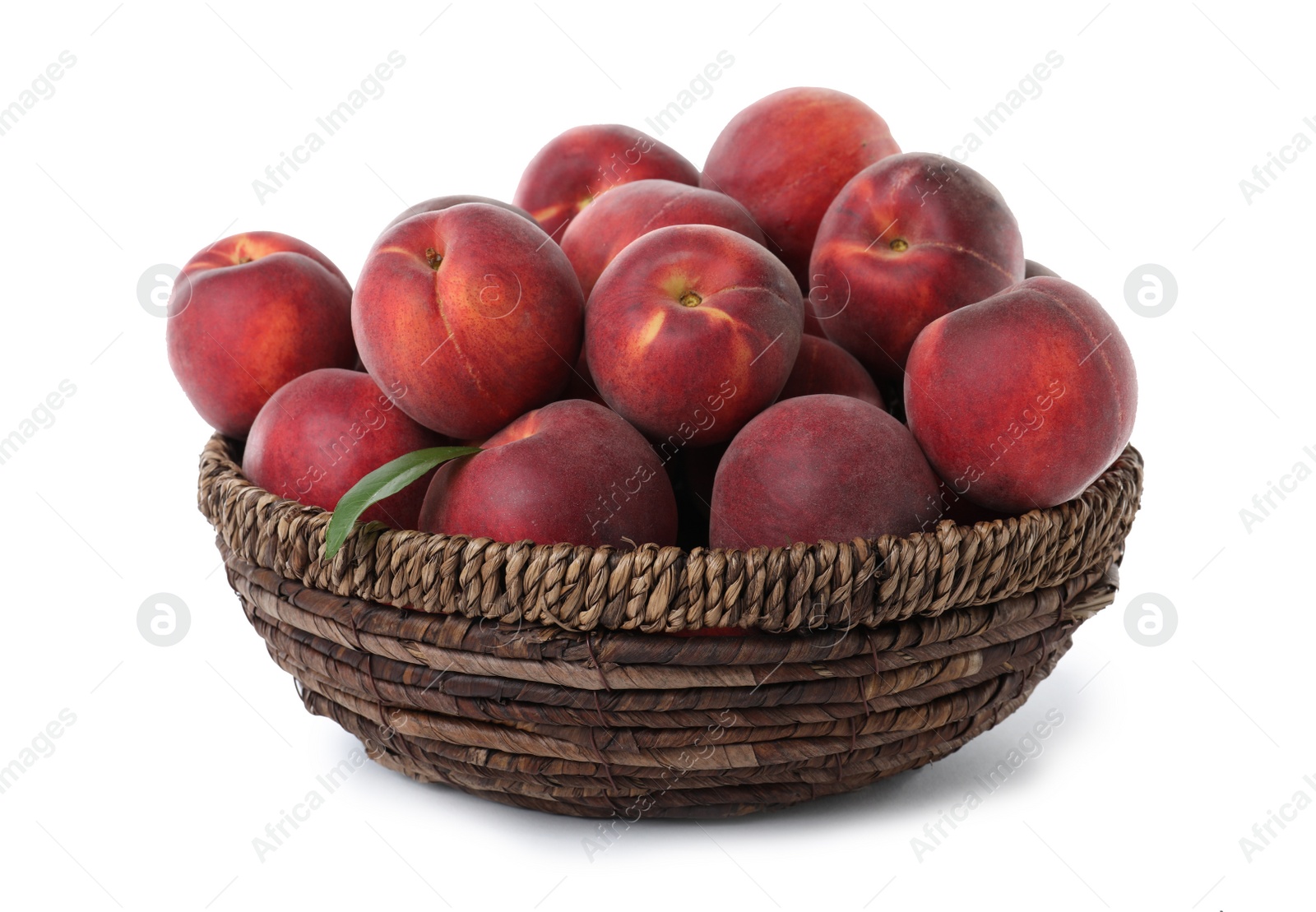 Photo of Basket of delicious ripe peaches isolated on white