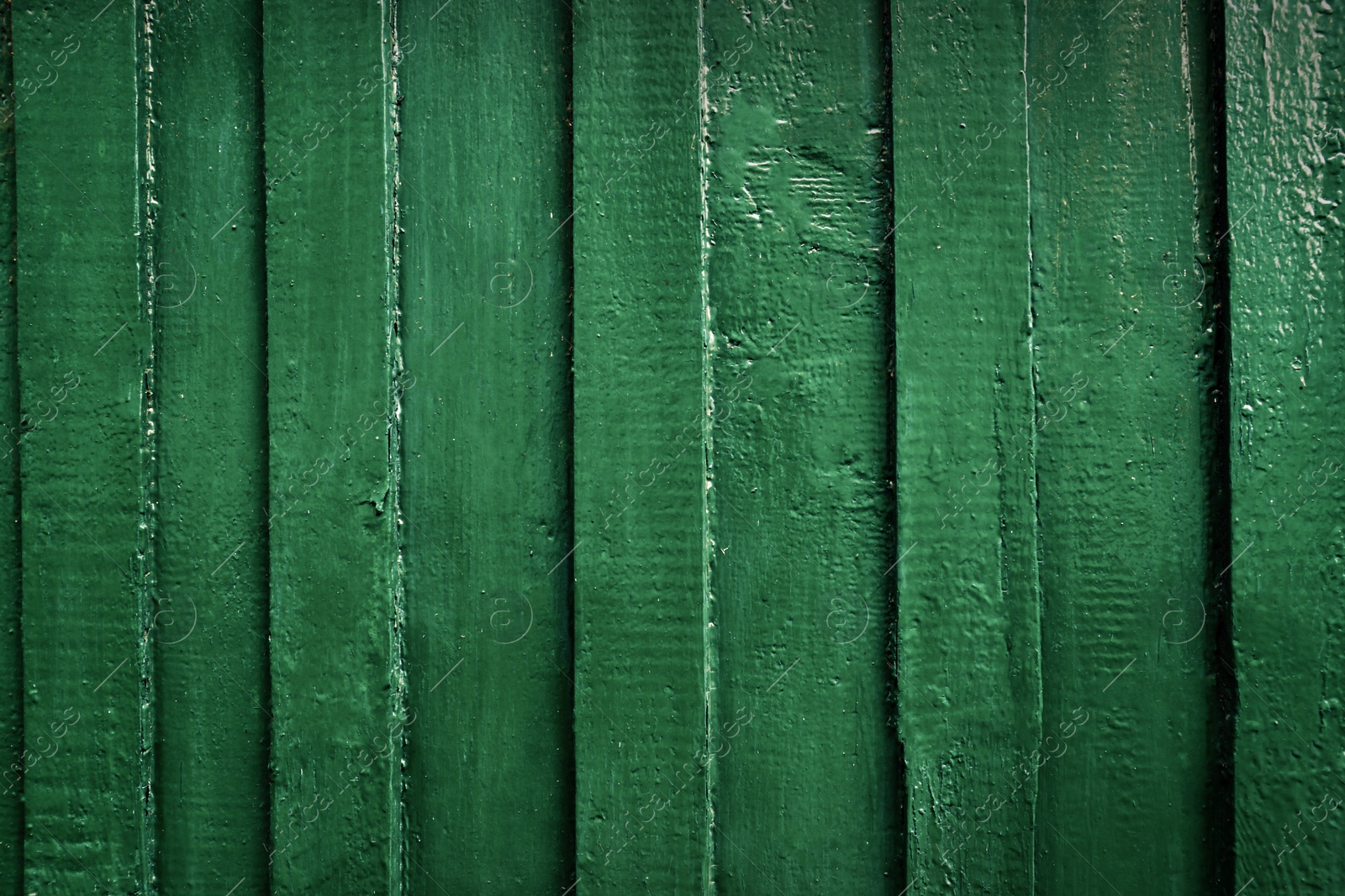 Photo of Texture of green wooden wall as background, closeup