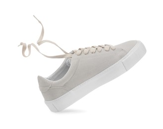 One stylish beige sneaker isolated on white