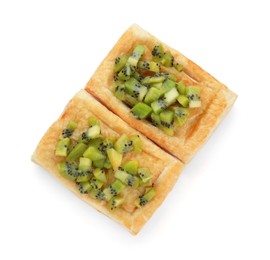 Photo of Fresh tasty puff pastry with kiwi isolated on white, top view