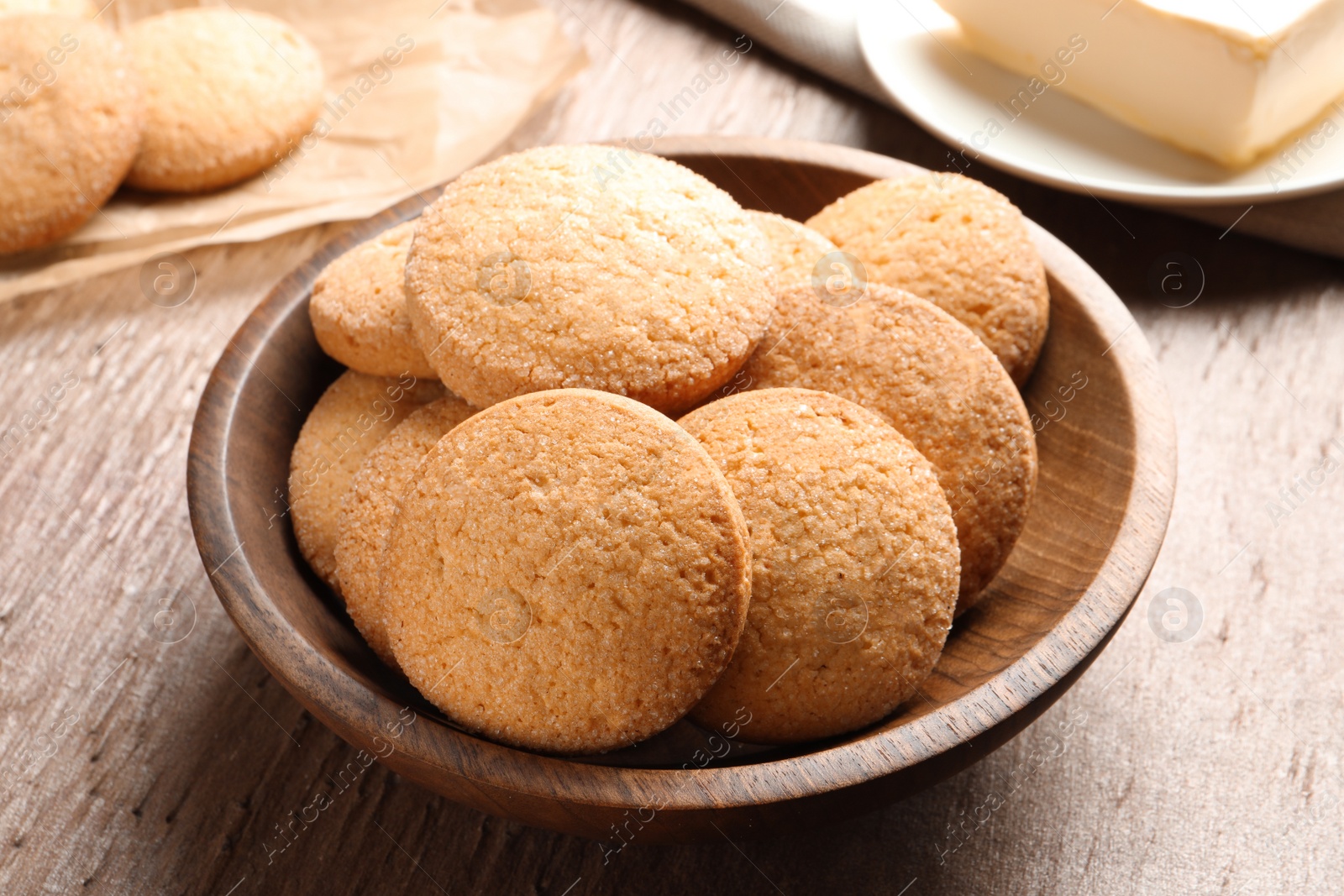 Photo of Bowl with Danish butter cookies on table