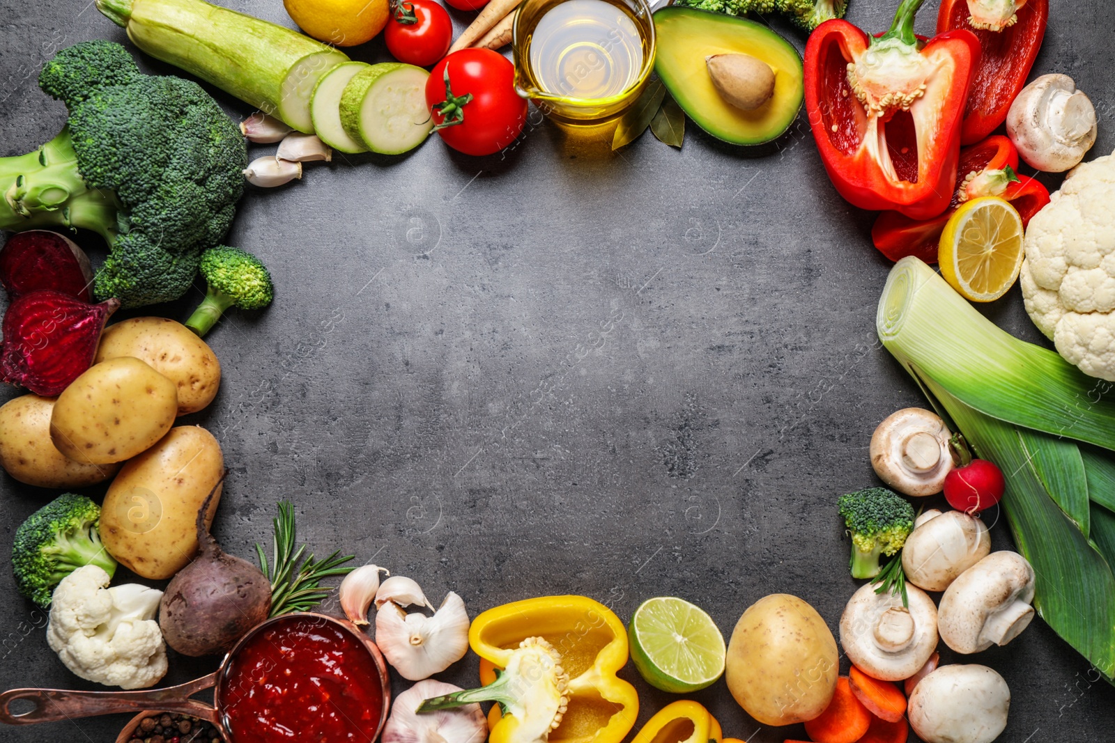 Photo of Flat lay composition with fresh products on grey table, space for text. Healthy cooking