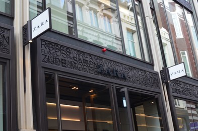 Photo of Amsterdam, Netherlands - June 18, 2022: Zara fashion store logo on building outdoors