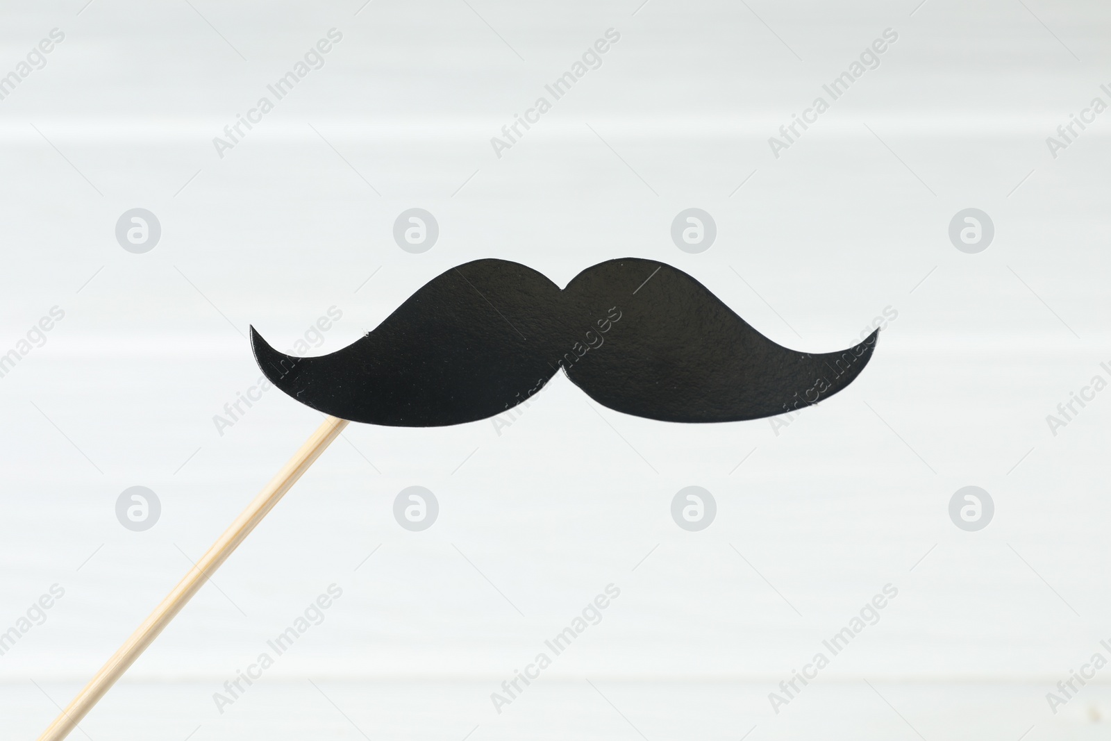 Photo of Fake paper mustache party prop isolated on white