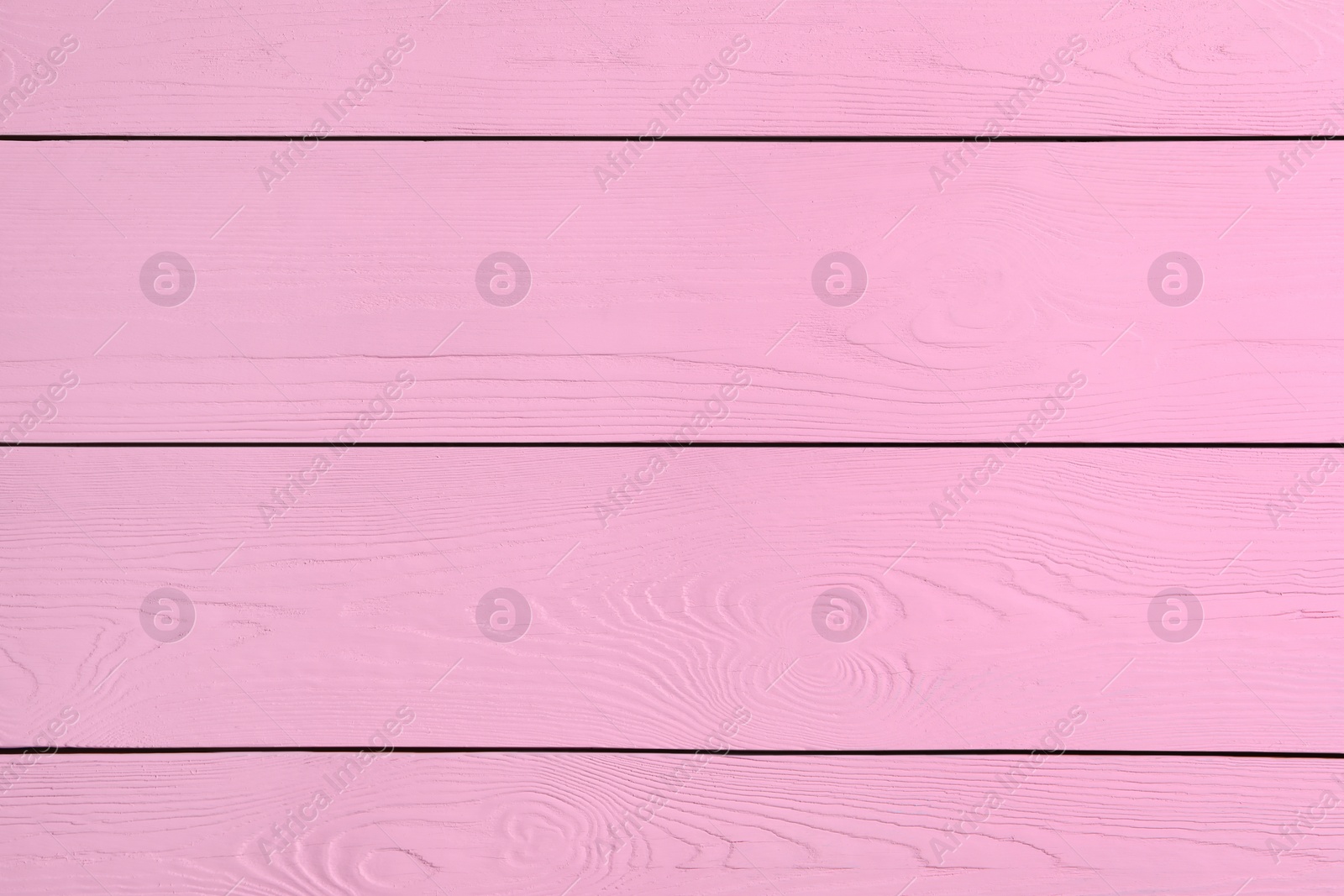 Photo of Texture of pink wooden surface as background, closeup