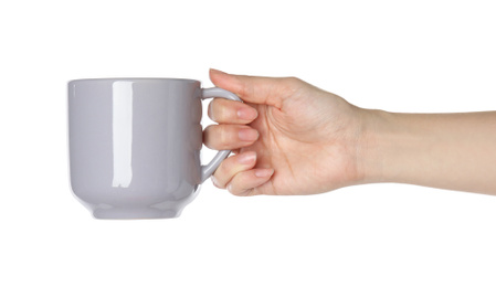 Photo of Woman holding grey cup on white background, closeup