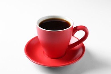 Photo of Red cup with aromatic coffee on white background