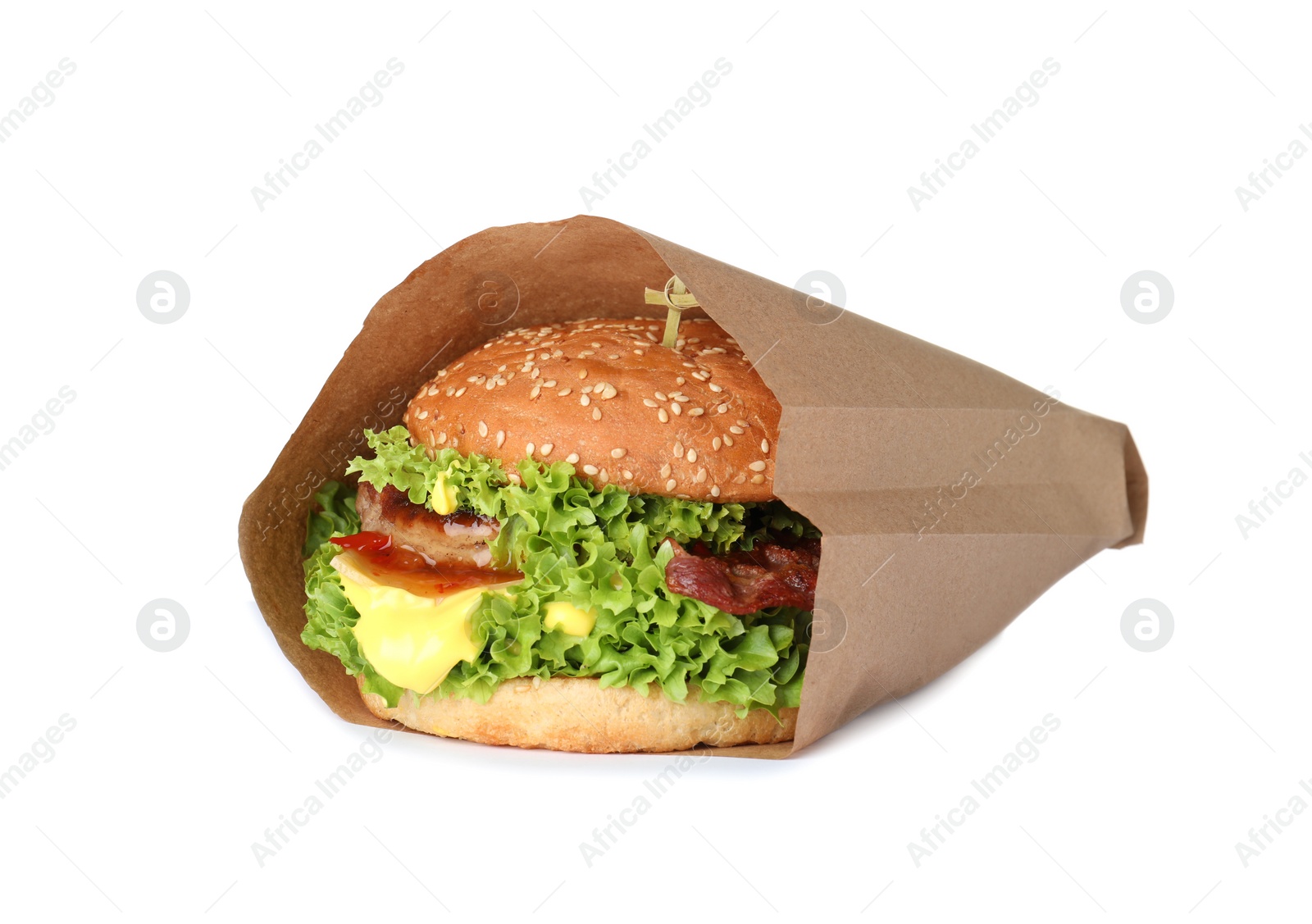 Photo of Fresh burger in craft paper on white background
