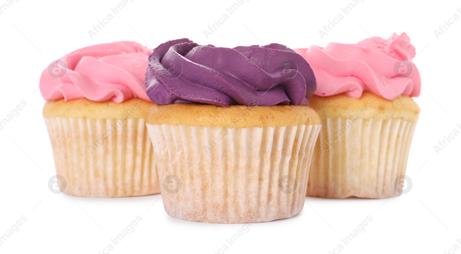 Photo of Delicious cupcakes with bright cream isolated on white