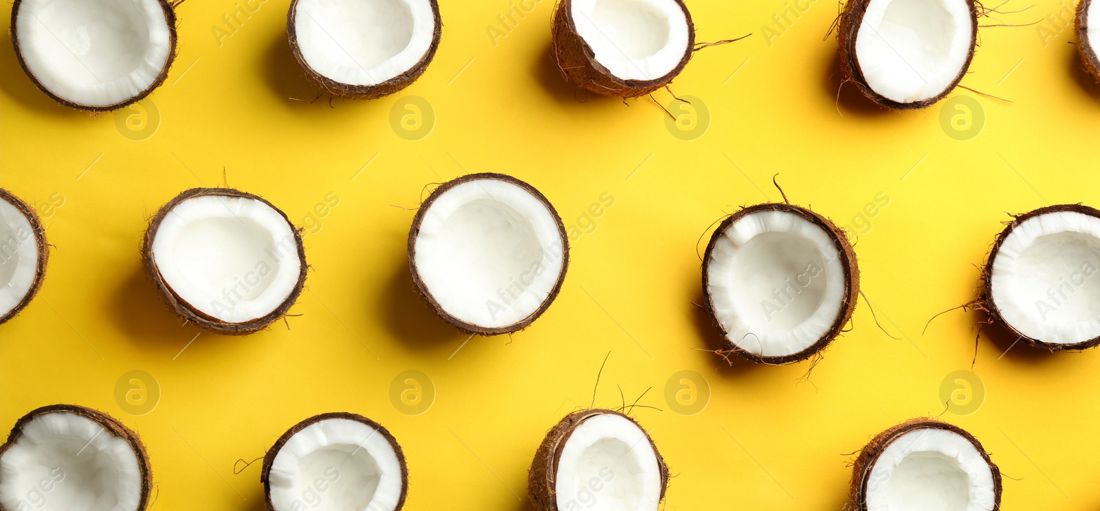 Photo of Coconut pattern on color background, flat lay