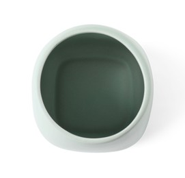 Photo of Bath accessory. Light green ceramic toothbrush holder isolated on white, top view