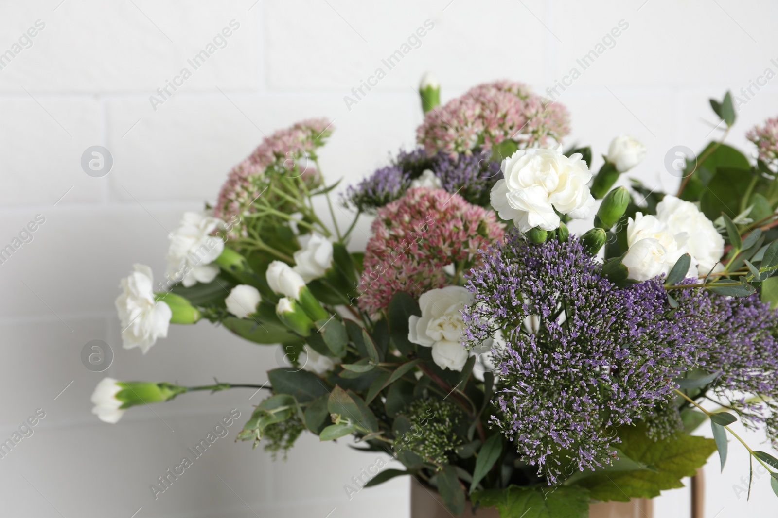 Photo of Bouquet of beautiful flowers on white background, closeup