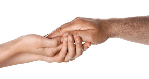 Photo of Woman holding hand of mature man on white background, closeup. Support concept