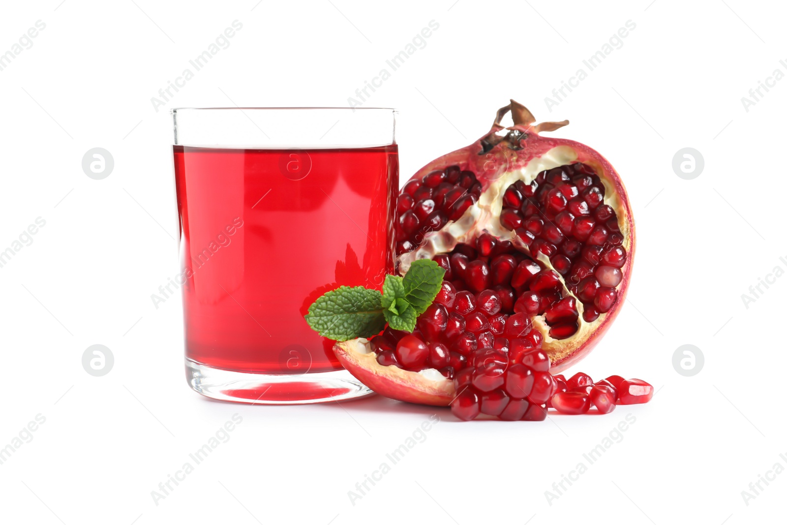 Photo of Glass of pomegranate juice and fresh fruits on white background