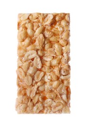 Photo of Tasty peanut bar (kozinaki) isolated on white, top view