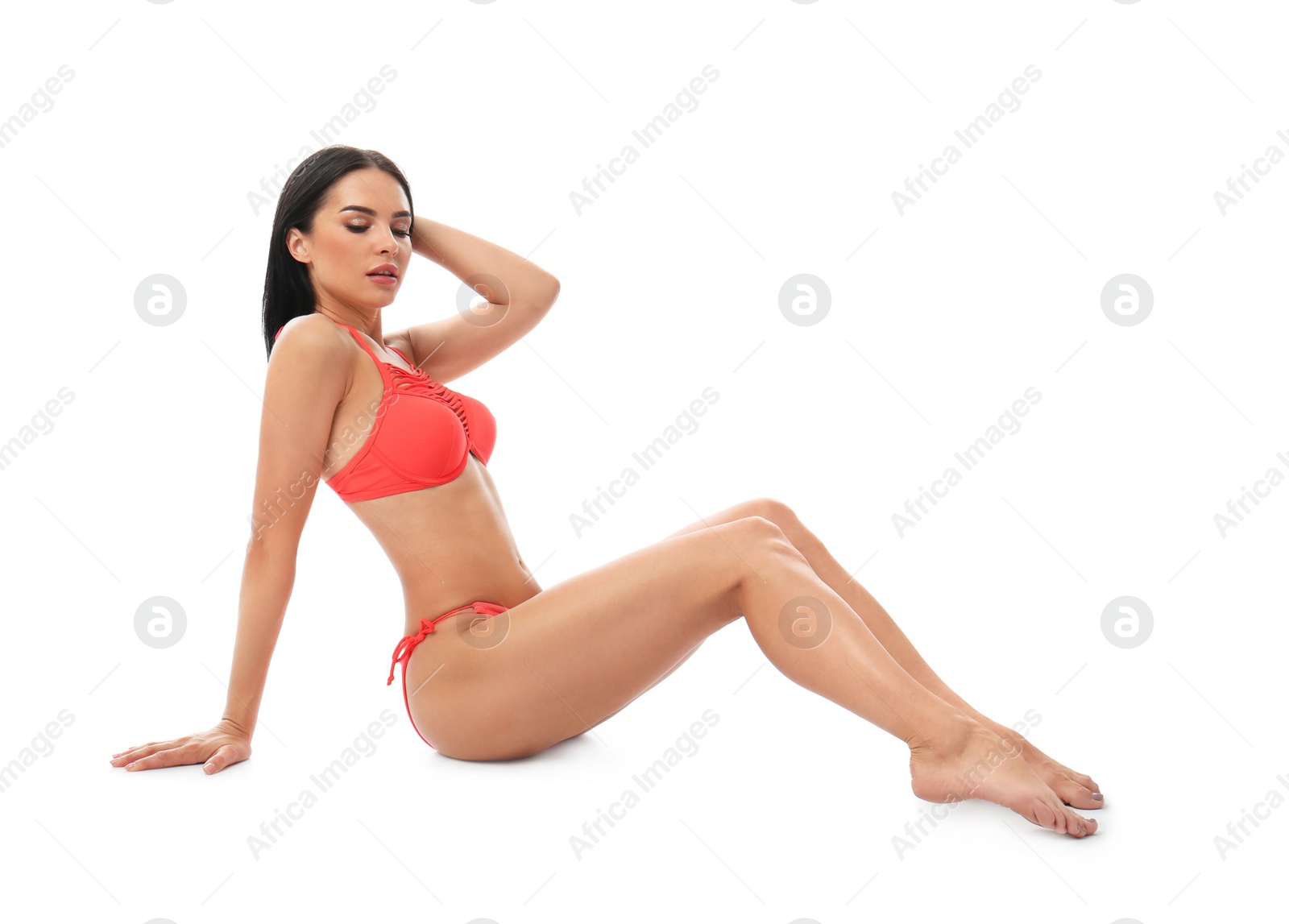 Photo of Beautiful young woman in stylish bikini on white background