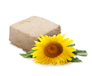 Image of Tasty halva and sunflower isolated on white