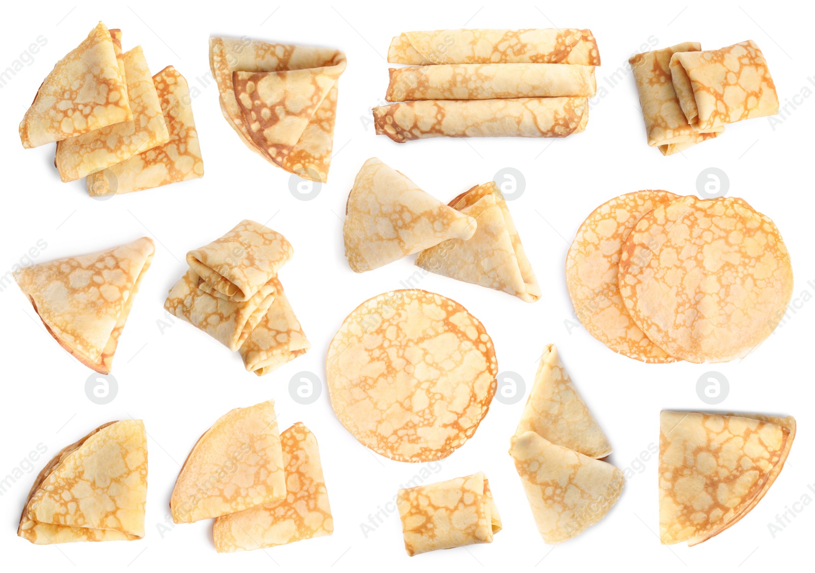 Image of Set of delicious thin pancakes on white background, top view