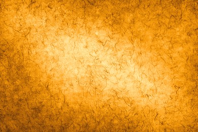 Image of Golden textured surface as background, closeup view