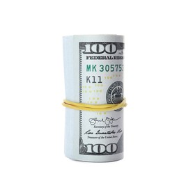 Photo of Rolled dollar banknotes on white background. American national currency