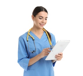 Photo of Portrait of medical assistant with stethoscope and tablet on white background