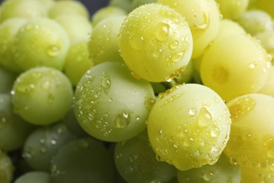 Photo of Bunch of green fresh ripe juicy grapes as background. Closeup view