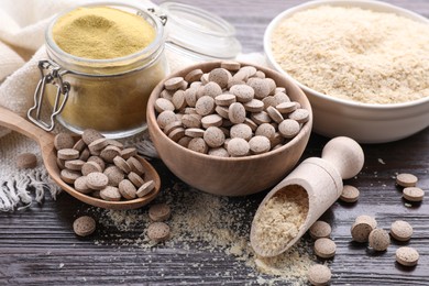 Photo of Different types of brewer`s yeast on wooden table