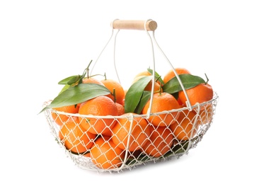 Photo of Fresh tangerines in metal basket on white background