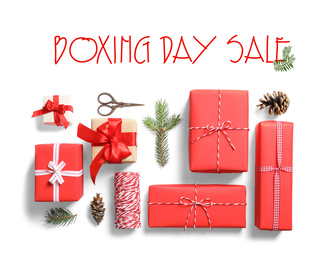 Image of Flat lay composition with gifts and text Boxing Day Sale on white background