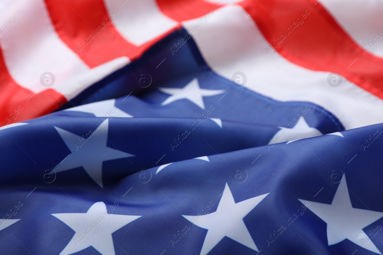 Photo of American flag as background, closeup. National symbol of USA