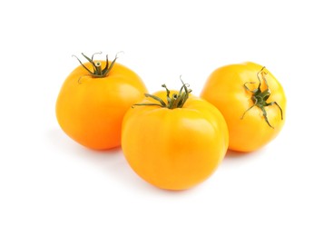 Photo of Fresh ripe yellow tomatoes on white background