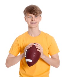 Photo of Teenage boy with american football ball on white background