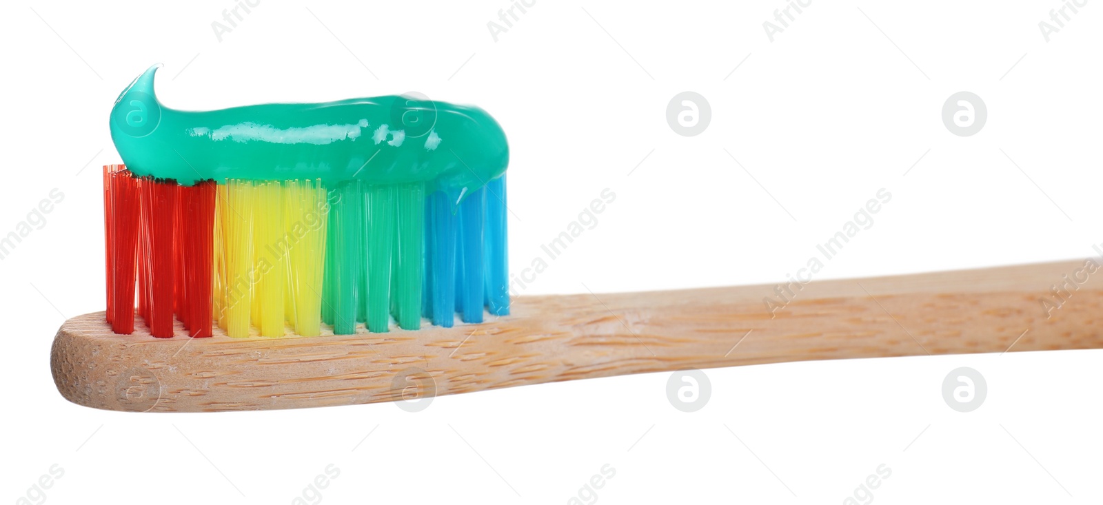 Photo of Wooden brush with toothpaste isolated on white, closeup