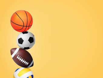 Image of Stack of different sport balls on gold background, space for text