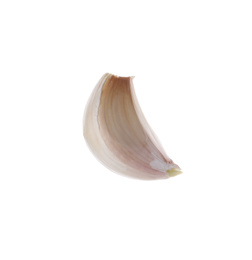 Photo of Fresh unpeeled garlic clove isolated on white