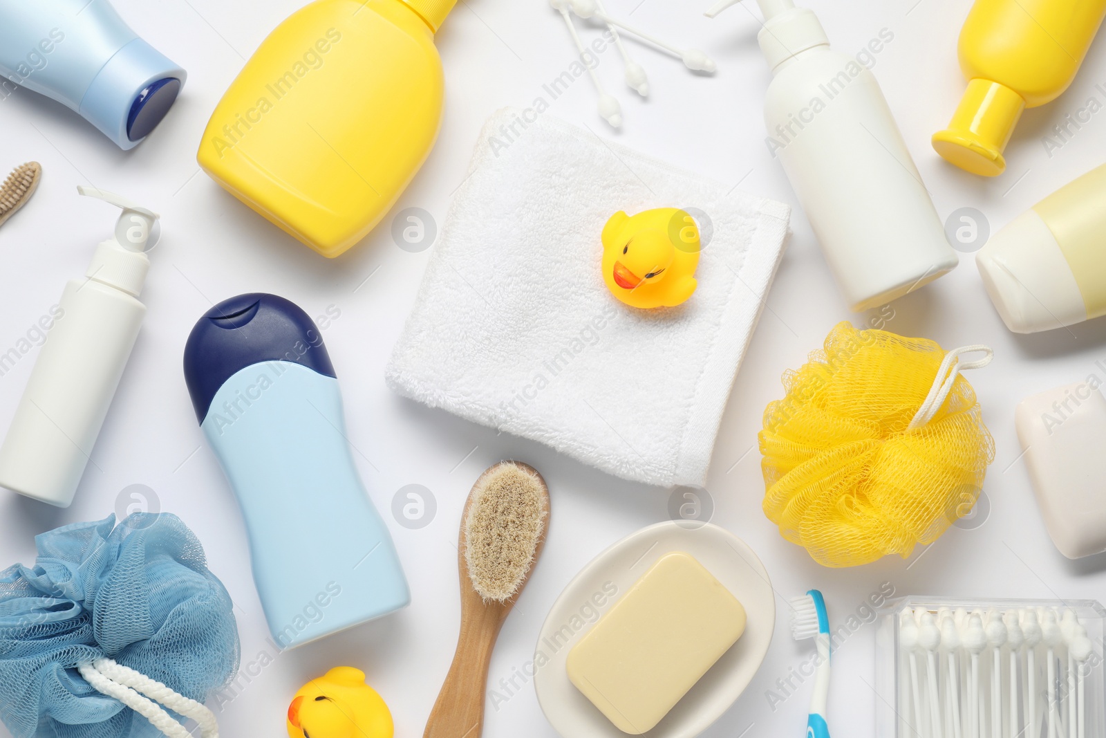 Photo of Baby bath accessories and care products on white background, flat lay