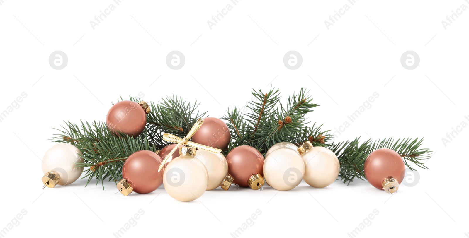 Photo of Beautiful Christmas balls and fir branches on white background