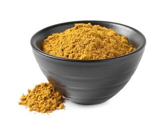 Photo of Dry curry powder in bowl isolated on white