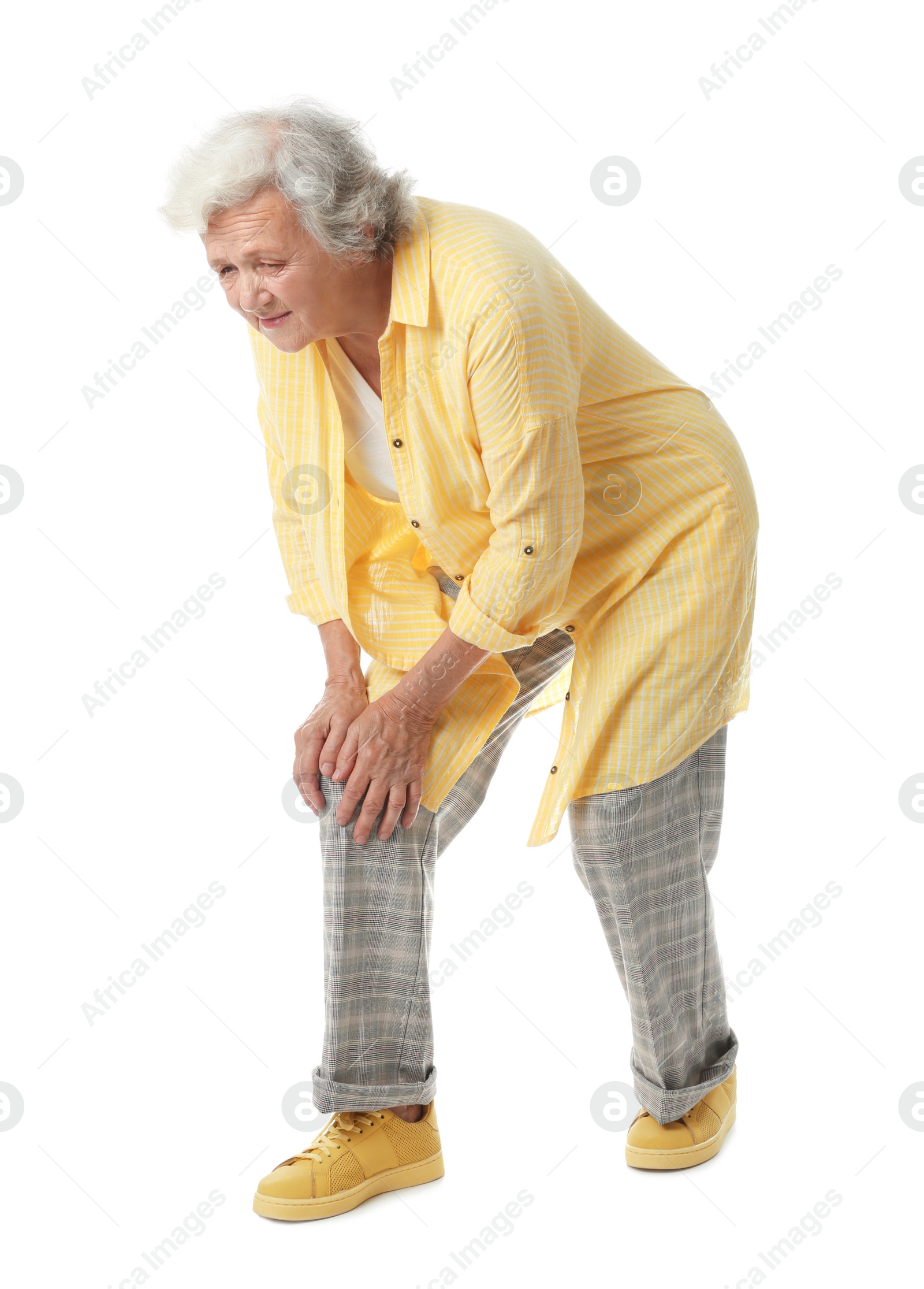 Photo of Full length portrait of senior woman having knee problems on white background