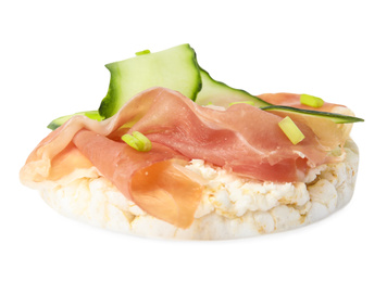 Photo of Puffed rice cake with prosciutto and cucumber isolated on white