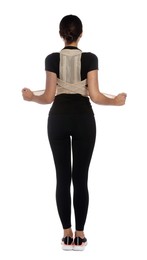 Woman with orthopedic corset on white background, back view