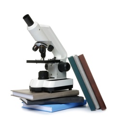 Photo of Microscope and books isolated on white. Medical students stuff