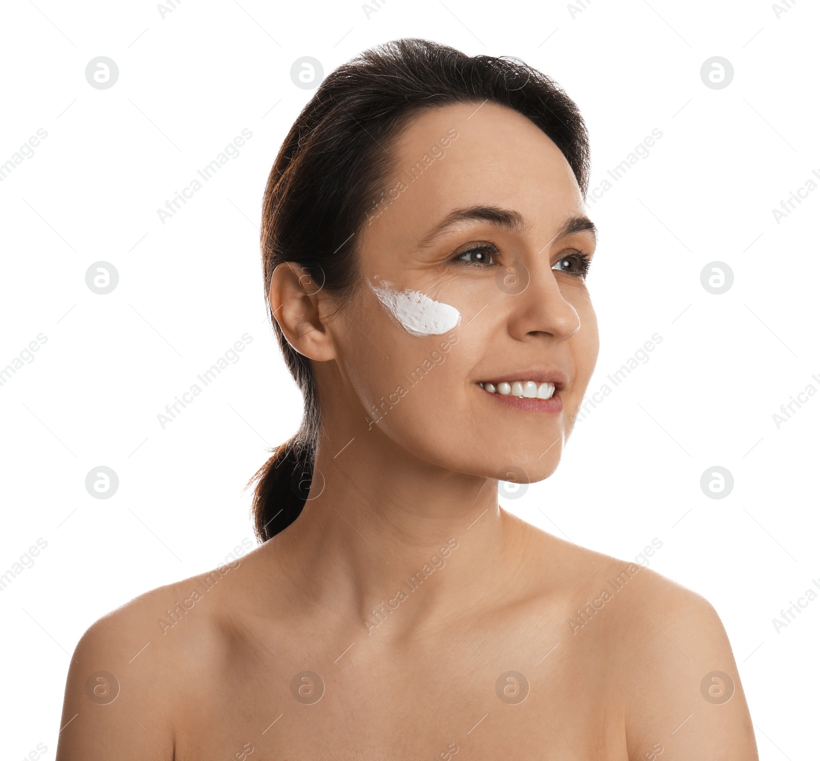 Photo of Woman with cream on face against white background