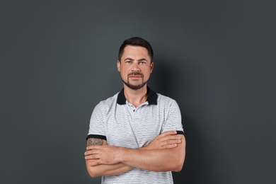 Portrait of handsome man on dark background