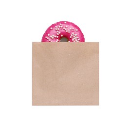 Photo of Paper package with tasty glazed donut on white background, top view