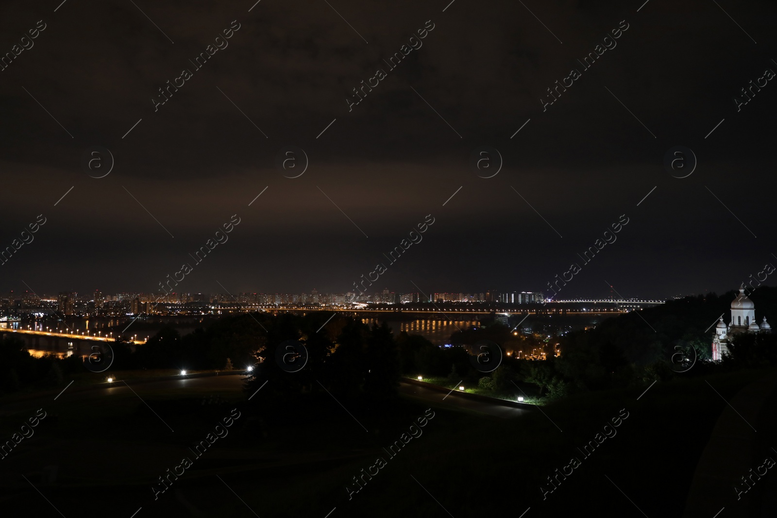 Photo of Beautiful view of bridge with illumination in modern city at night