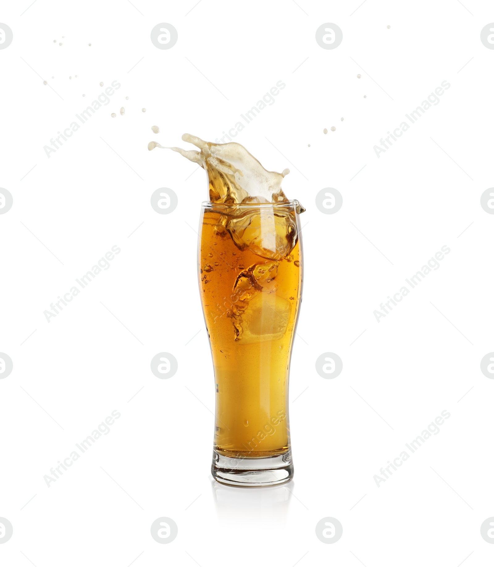 Photo of Beer splashing out of glass on white background