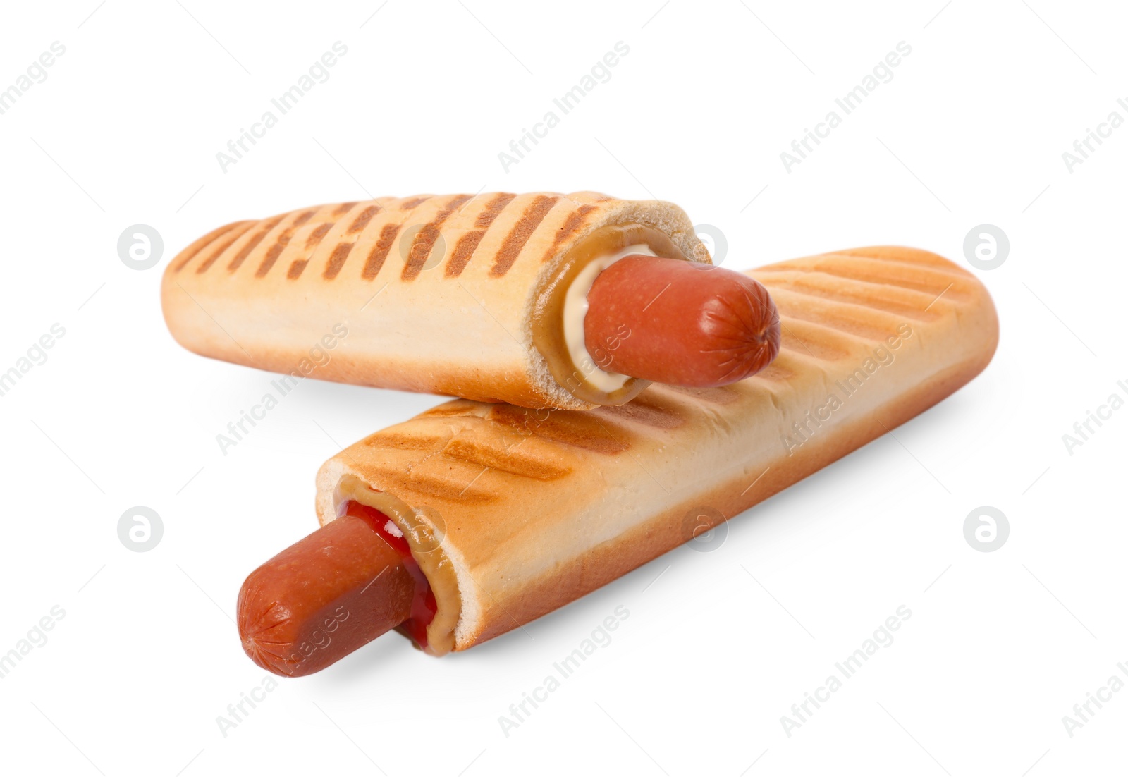 Photo of Tasty french hot dogs with different sauces on white background