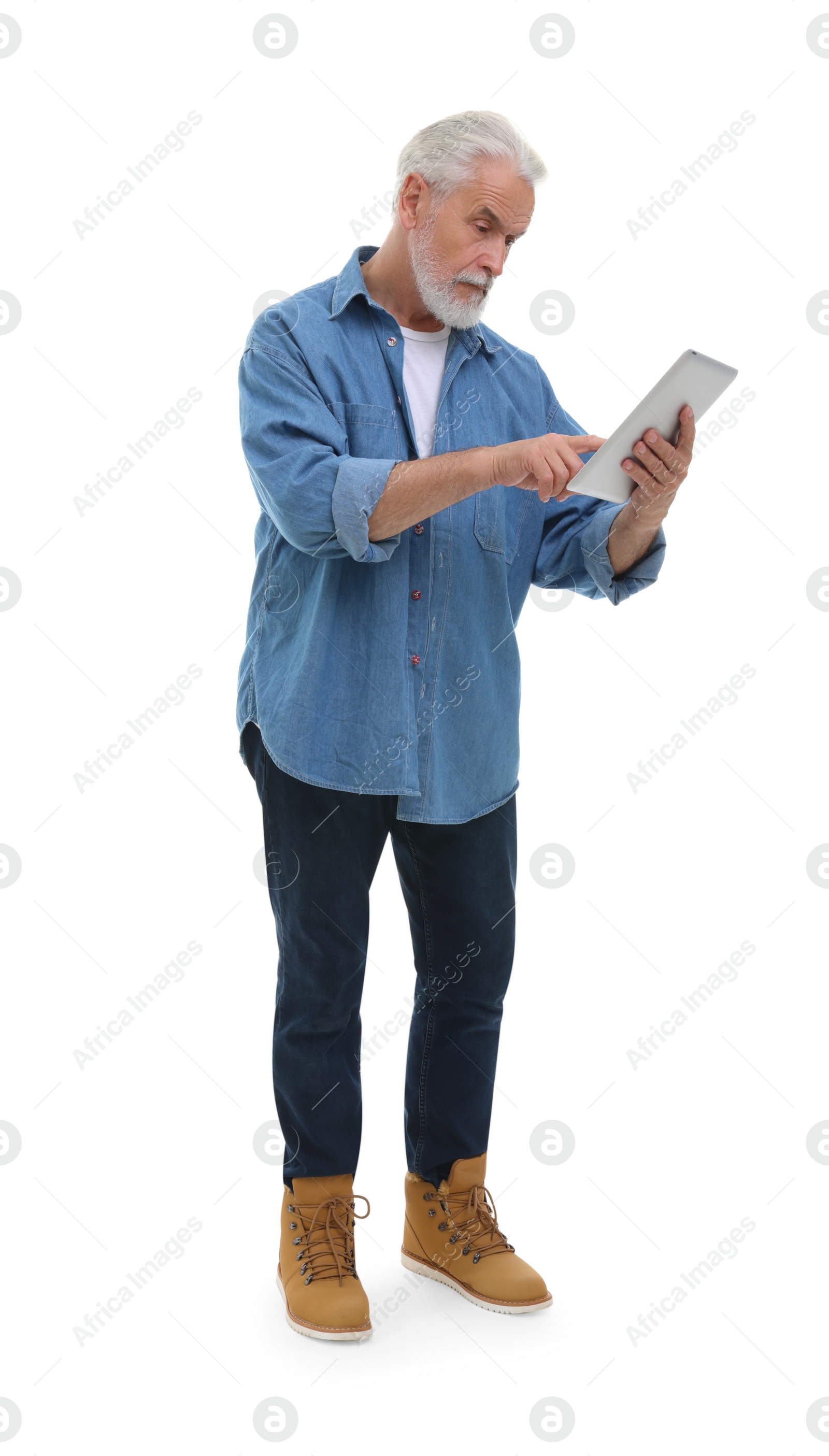 Photo of Senior man using tablet on white background