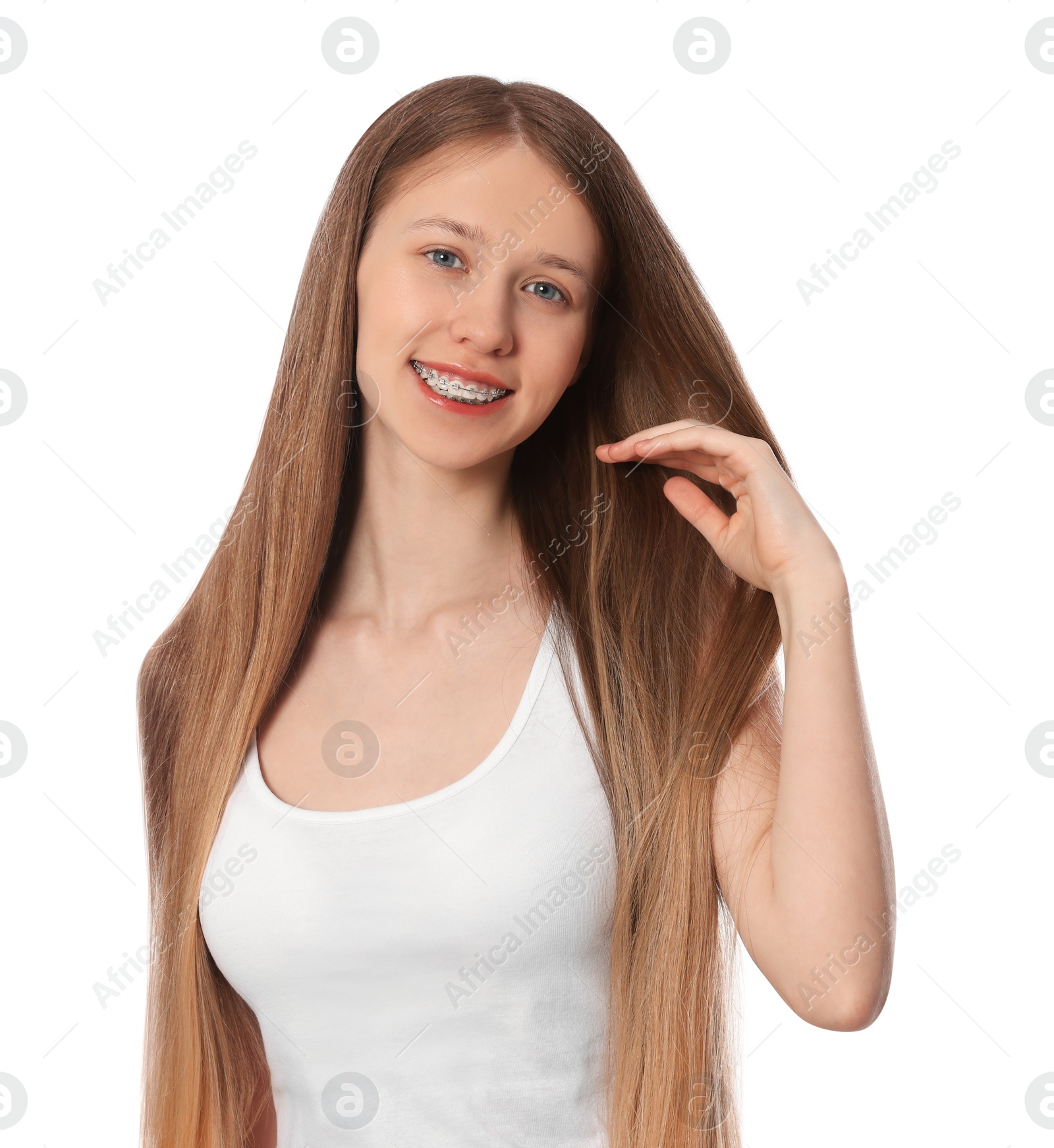 Photo of Teenage girl with strong healthy hair on white background